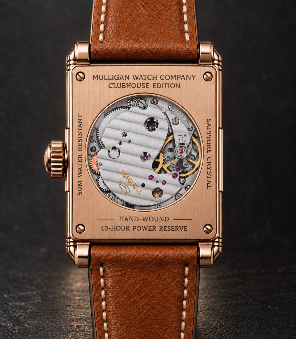 Clubhouse Edition rose gold exhibition caseback showing the hand-wound movement